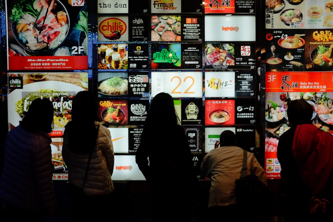 Digital signage menu boards in a restaurant counter environment