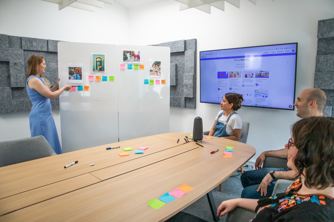 Evoko Liso meeting room display panel showing room availability status