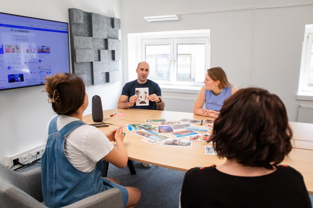 Meeting room AV equipment including speakerphone and conferencing hardware on a table