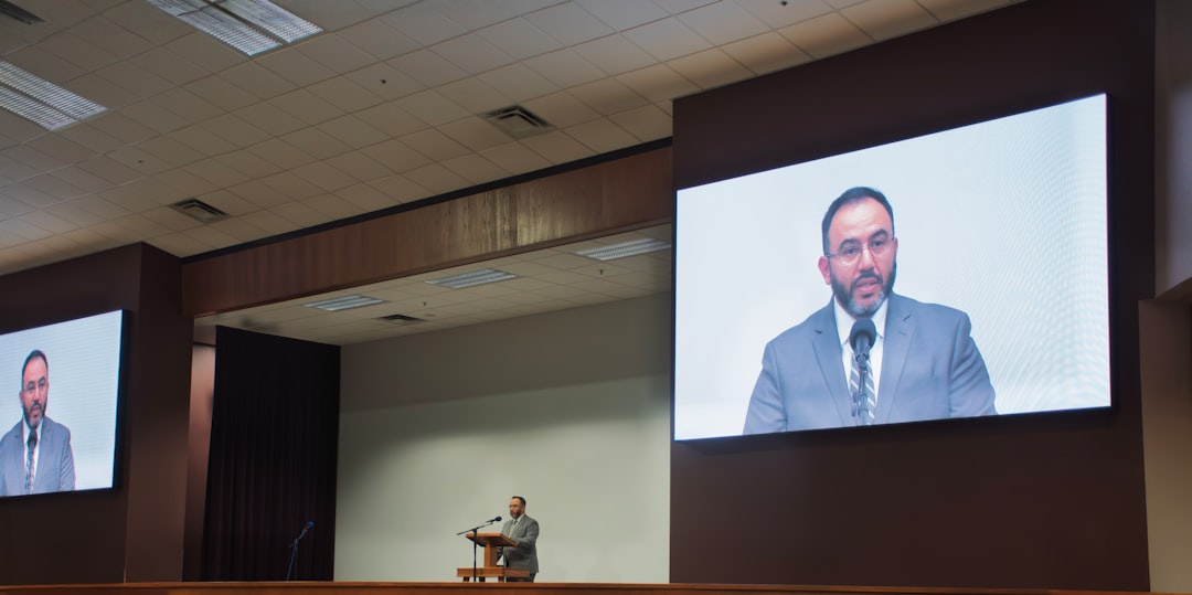 Poppulo enterprise digital signage platform on large format lobby screen