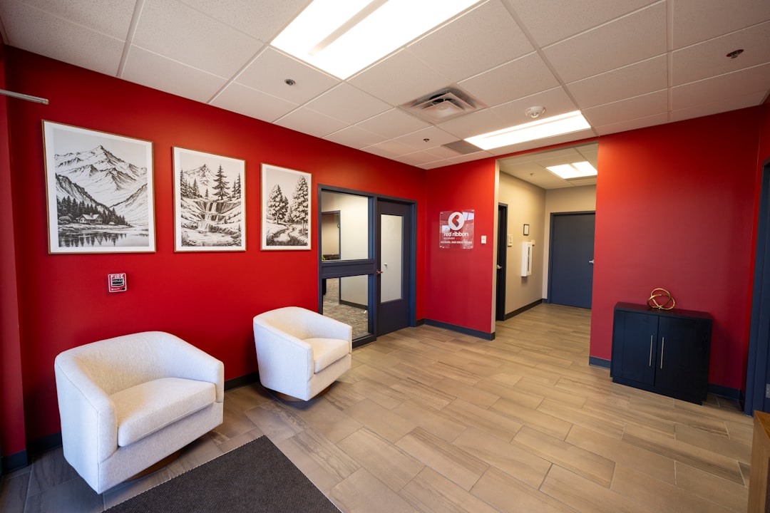 Digital signage display screen showing scheduled content in a corporate reception