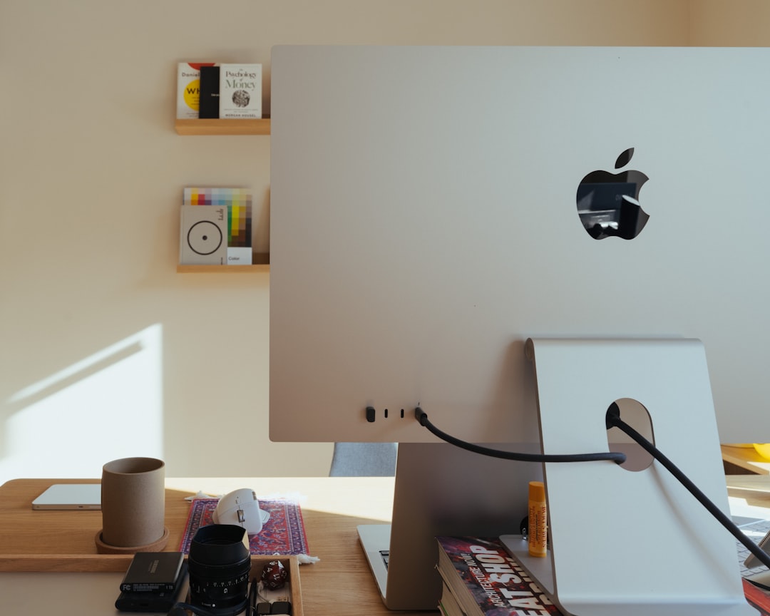 Yodeck vs OptiSigns digital signage software displayed on modern office screens